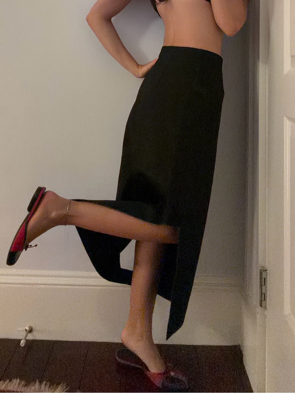 Black asymmetrical cut out skirt